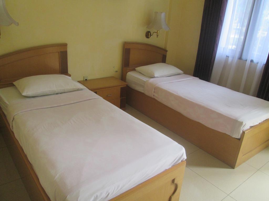 Sapadia Hotel And Cottage Parapat Quarto foto